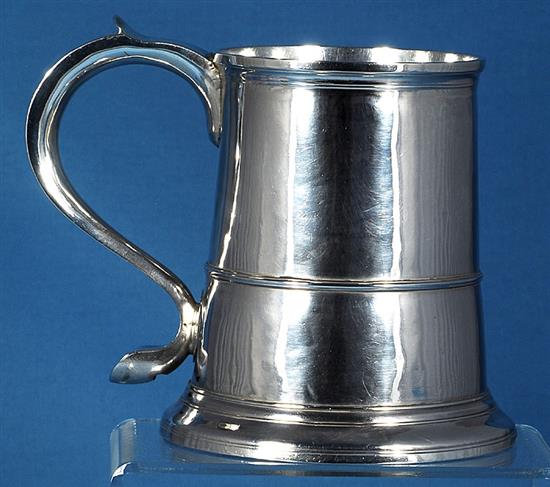 A George II provincial silver mug, height 143mm, weight 13.3oz/416grms.